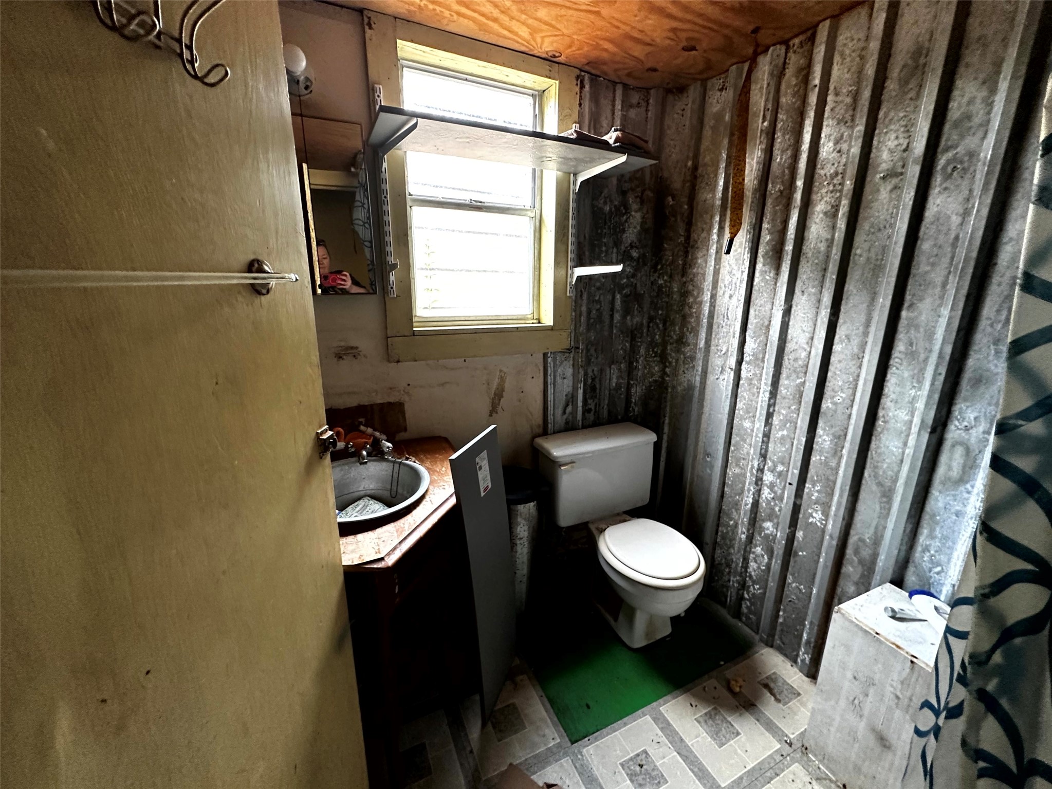 5800 Outlaw Bend Road Livingston, TX 77351 - Photo 20 of 29 a bathroom with a granite countertop toilet and a sink