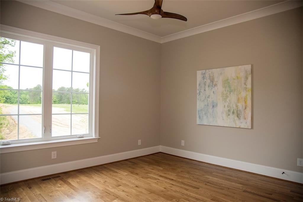 6900 Matzinger Court Oak Ridge, NC 27310 - Photo 14 of 30 Main level bedroom/playroom.