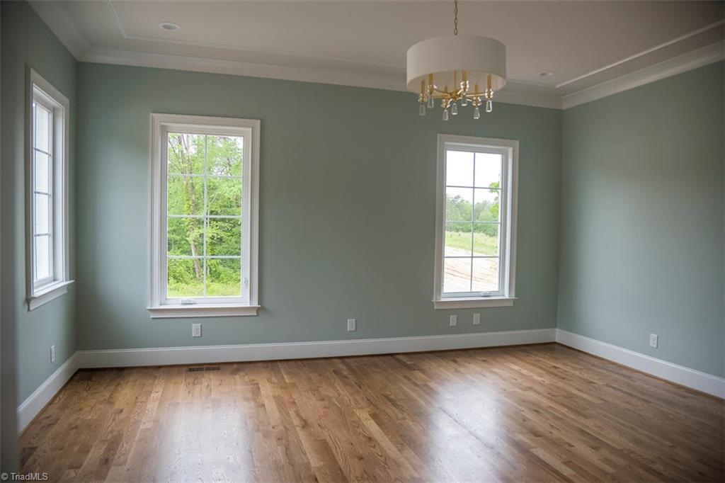 6900 Matzinger Court Oak Ridge, NC 27310 - Photo 15 of 30 Master bedroom.