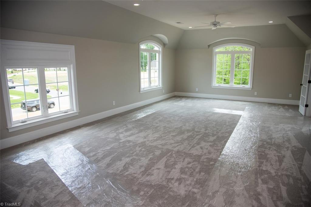 6900 Matzinger Court Oak Ridge, NC 27310 - Photo 20 of 30 Bonus room pre-wired for Surround Sound.