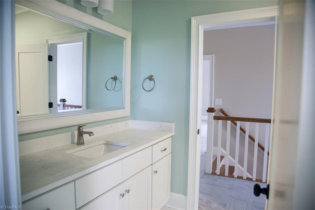 6900 Matzinger Court Oak Ridge, NC 27310 - Photo 24 of 30 One of the second floor baths.