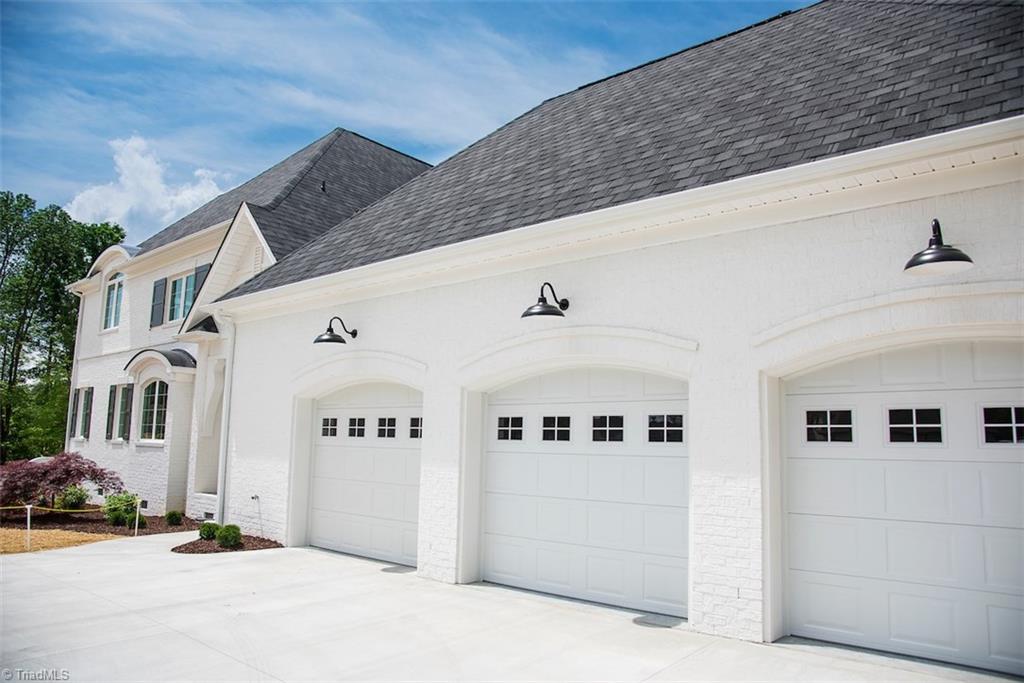 6900 Matzinger Court Oak Ridge, NC 27310 - Photo 28 of 30 Garage doors finished front and back with insulation.