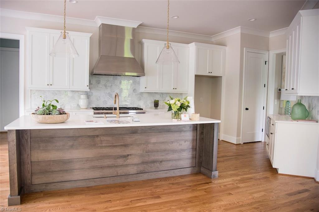 6900 Matzinger Court Oak Ridge, NC 27310 - Photo 7 of 30 Kitchen with Quartz countertops.