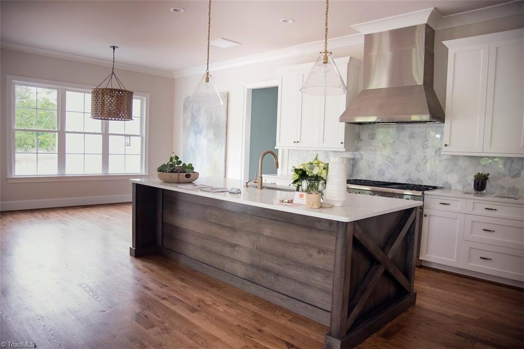 6900 Matzinger Court Oak Ridge, NC 27310 - Photo 8 of 30 Eat in kitchen with island.