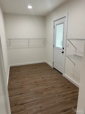 a view of an empty walk in closet