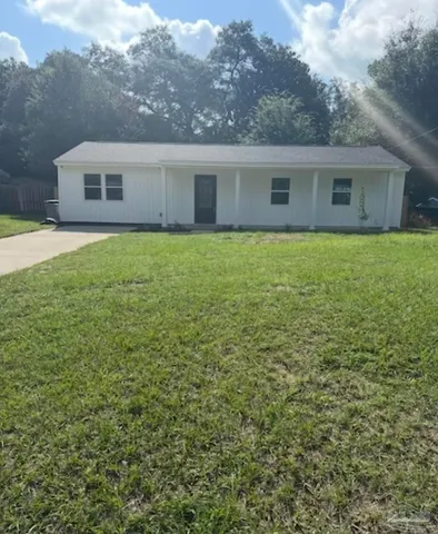 a house view with a garden space