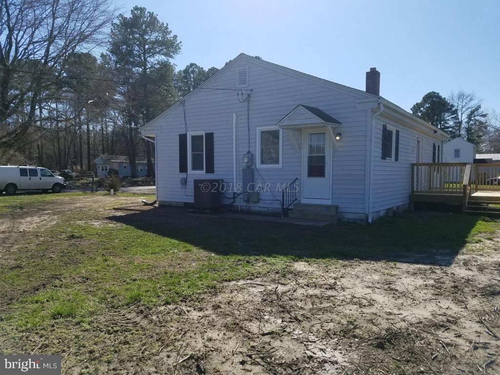 28234 Stanford Road Eden, MD 21822 - Photo 6 of 35 a front view of a house with a yard