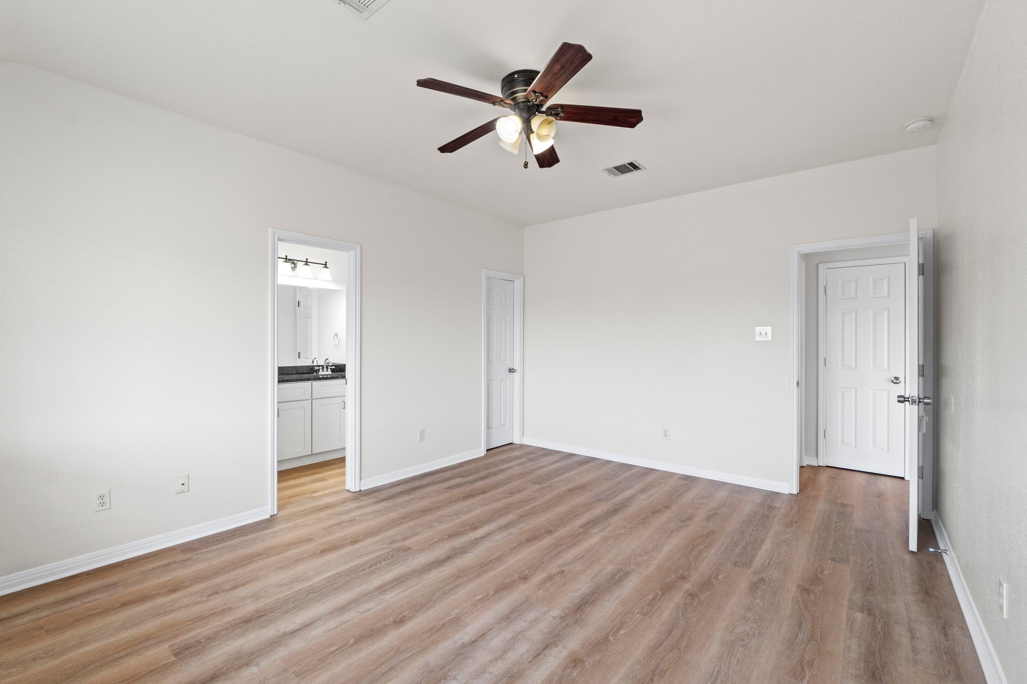 902 Terra Street Round Rock, TX 78665 - Photo 21 of 35 a view of empty room with wooden floor