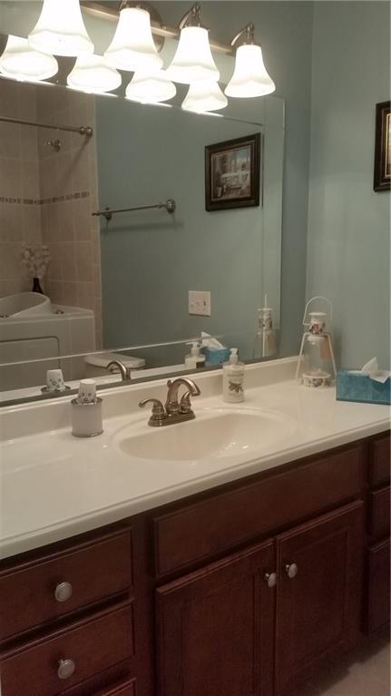 2321 Haymaker Road Monroeville, PA 15146 - Photo 16 of 25 Nicely appointed main bathroom! Cherry Cabinets, updated lighting and Walk in Tub