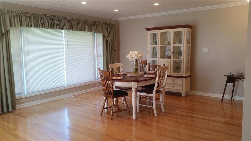 2321 Haymaker Road Monroeville, PA 15146 - Photo 7 of 25 Open Dining room with Wall to wall Windows. Hardwood flooring & Recessed Lighting! Freshly painted