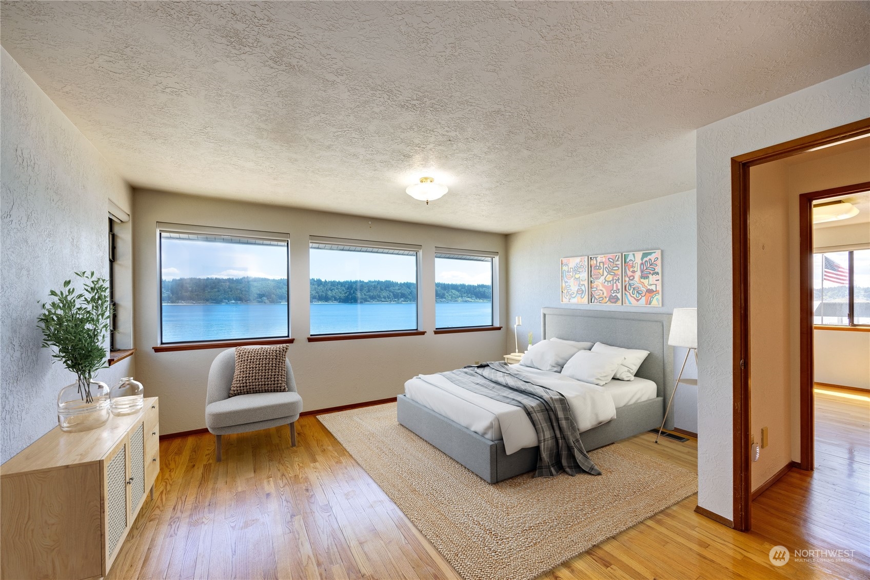 924 Shore Drive Bremerton, WA 98310 - Photo 19 of 36 a bedroom with a bed and a large window