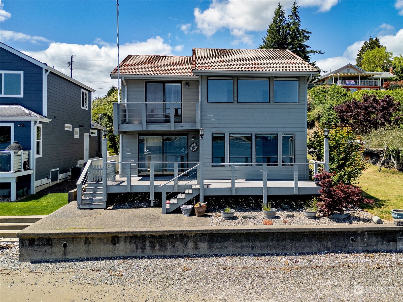 924 Shore Drive Bremerton, WA 98310 - Photo 27 of 36 a front view of a house with swimming pool