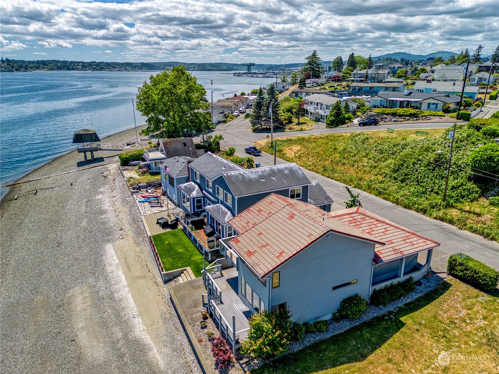 924 Shore Drive Bremerton, WA 98310 - Photo 29 of 36 a view of a house with a garden and plants