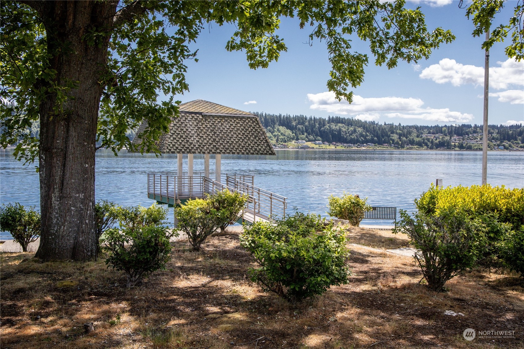 924 Shore Drive Bremerton, WA 98310 - Photo 36 of 36 a view of a lake with a garden