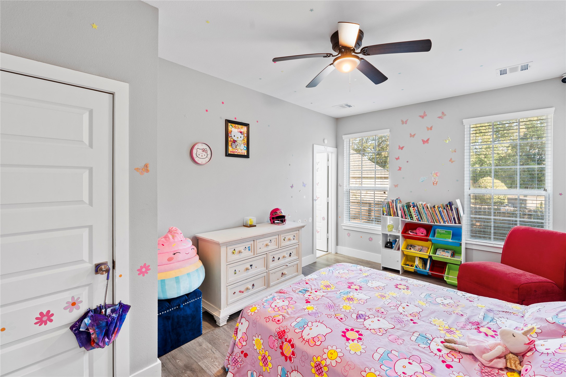 6207 Graff Net Court Spring, TX 77379 - Photo 16 of 49 Spacious bedroom with large windows letting in plenty of natural light.