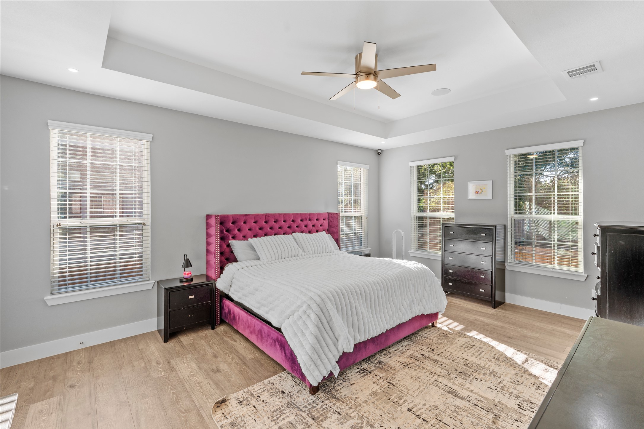 6207 Graff Net Court Spring, TX 77379 - Photo 23 of 49 Wake up in this stunning primary suite with tray ceilings and plenty of natural light!