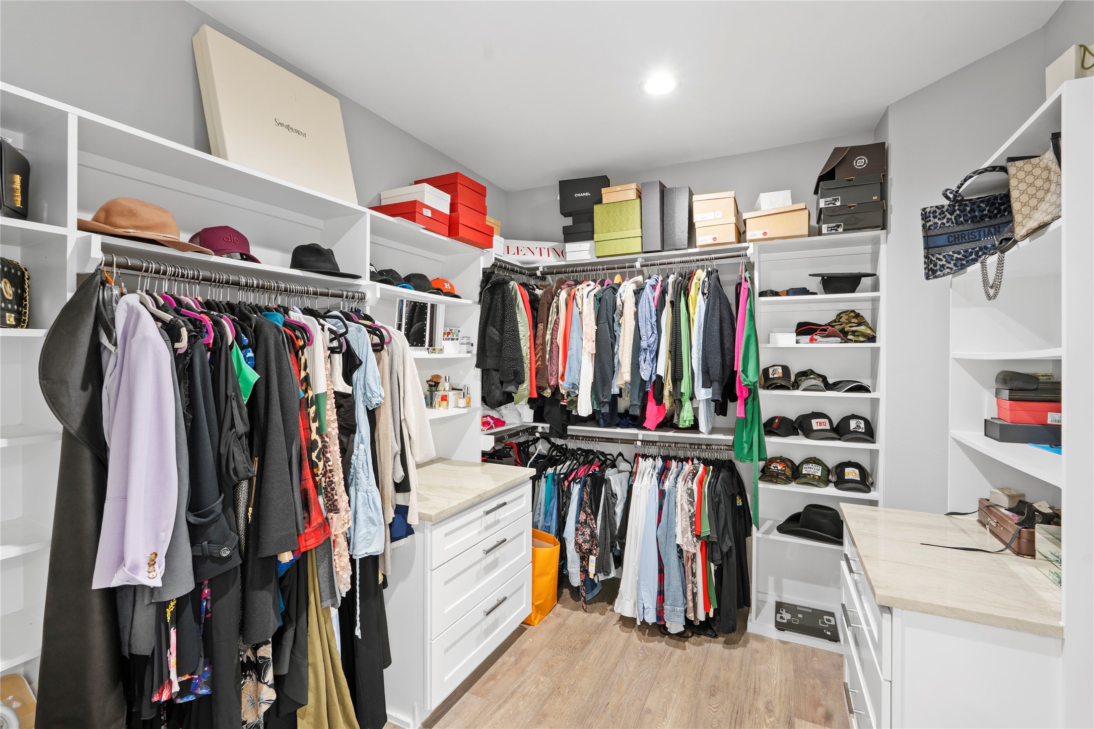 6207 Graff Net Court Spring, TX 77379 - Photo 27 of 49 Organize like a pro in this massive custom walk-in closet with drawers and shelves for everything!