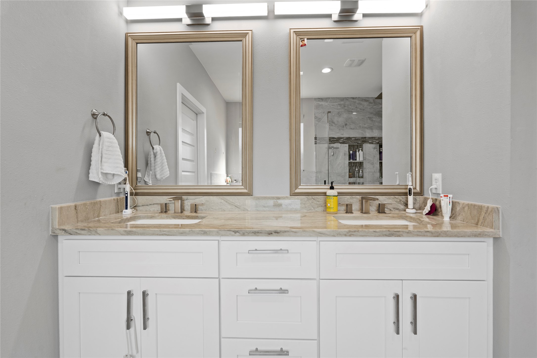 6207 Graff Net Court Spring, TX 77379 - Photo 29 of 49
Dual vanities with mirrors for double the convenience (and double the selfies).
