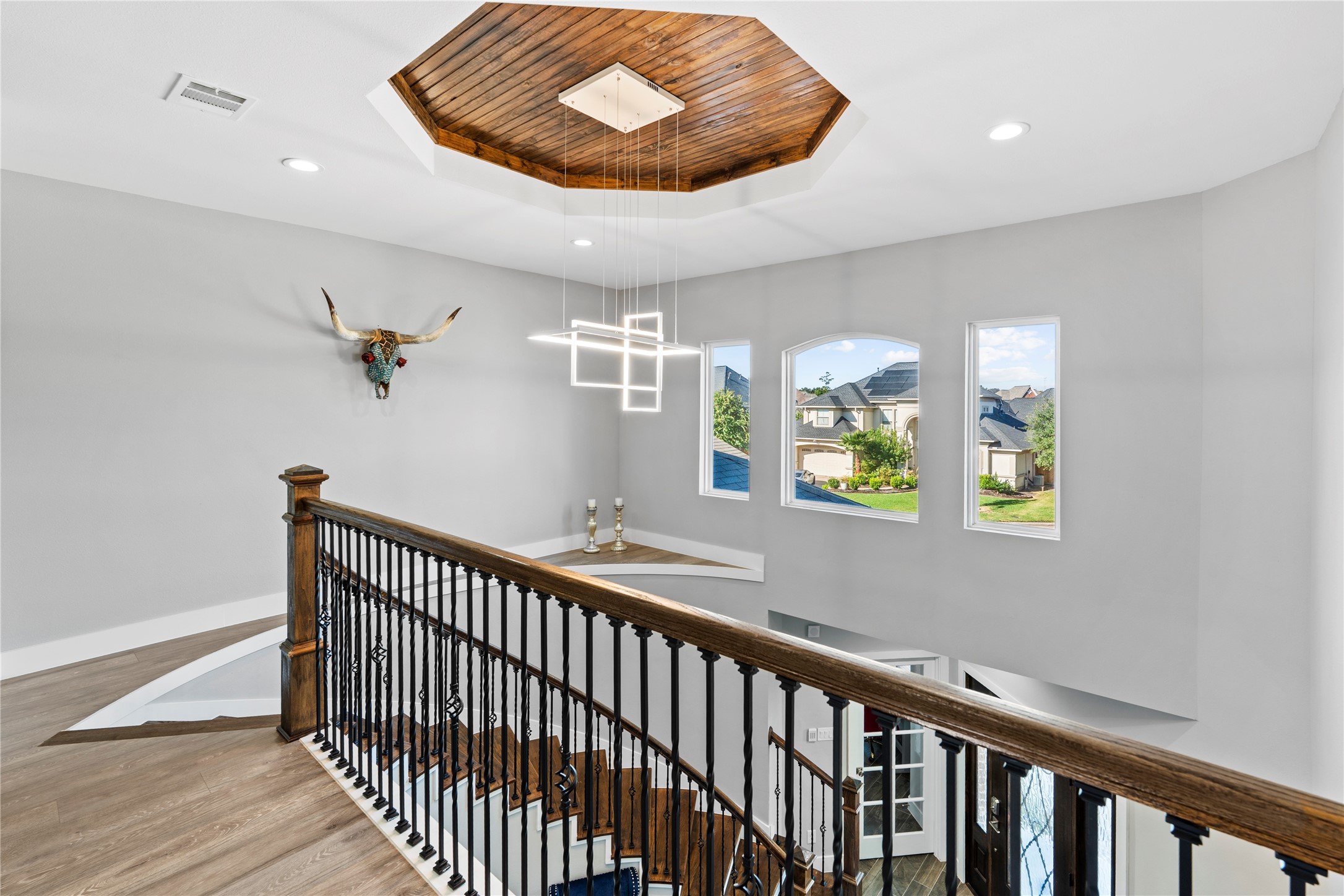 6207 Graff Net Court Spring, TX 77379 - Photo 31 of 49 Staircase view so stunning, you might stop mid step just to admire the chandelier and sunlit tray ceilings!