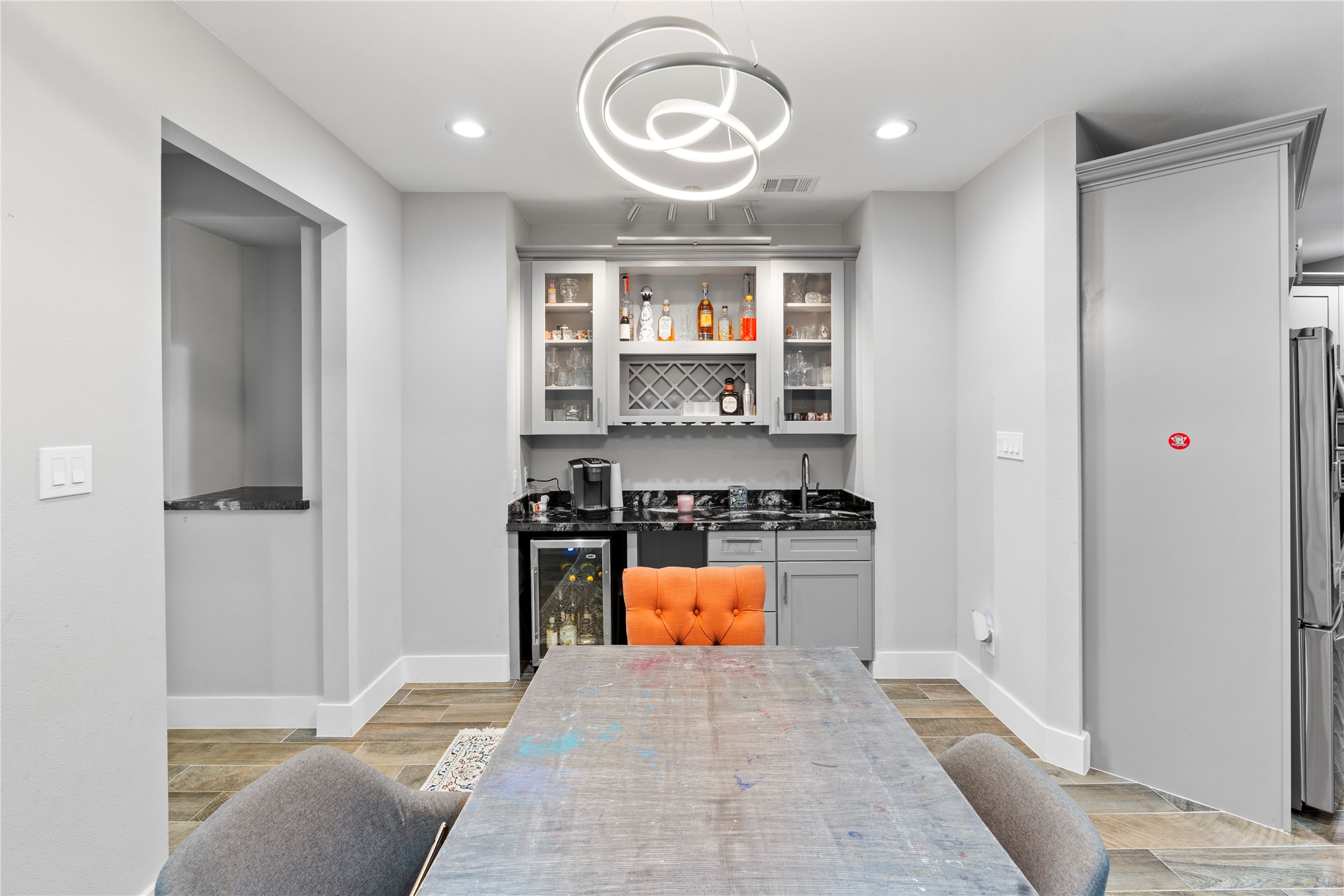 6207 Graff Net Court Spring, TX 77379 - Photo 41 of 49 Custom bar with fridge and sink, everything you need for cocktail hour (or juice box hour).