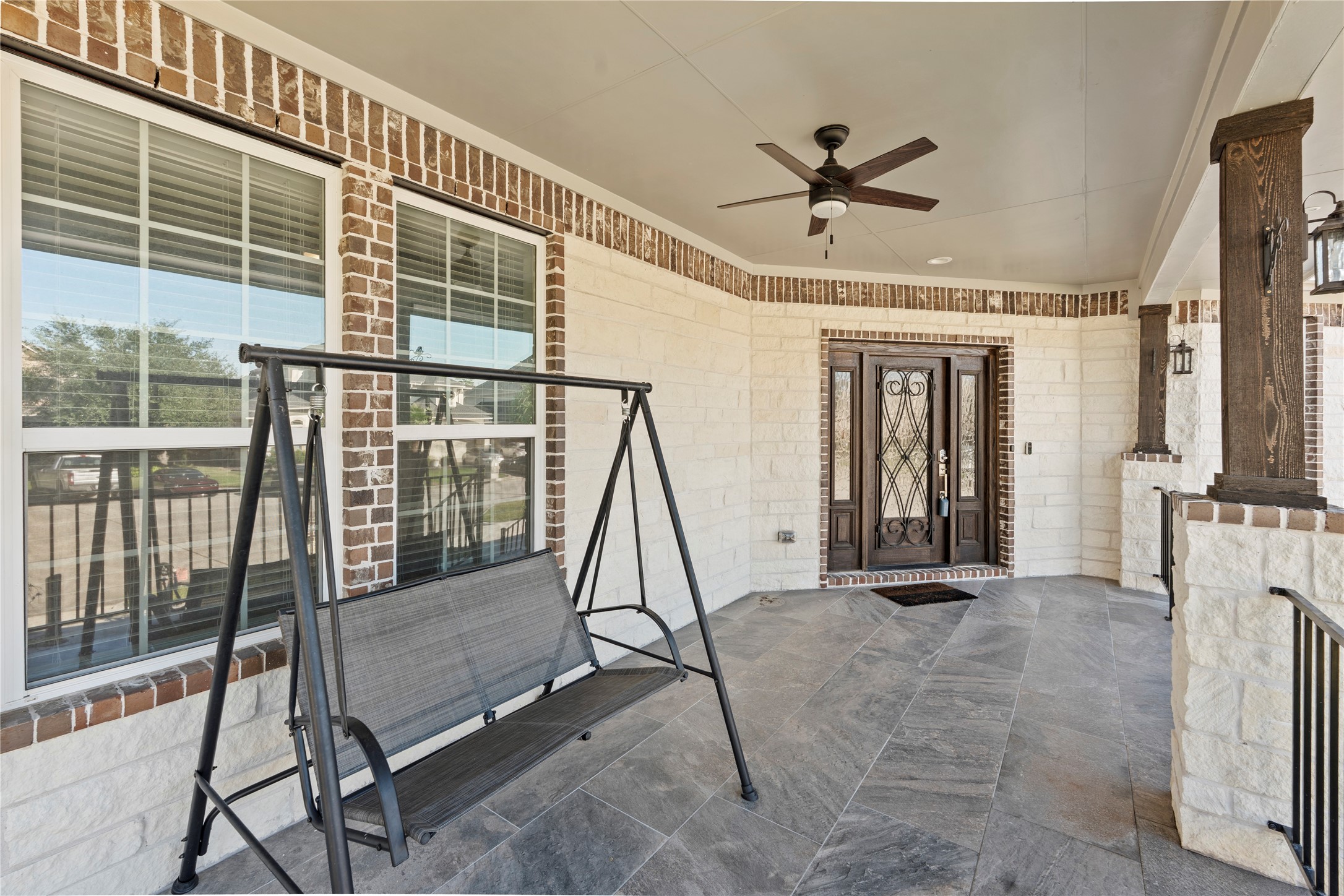 6207 Graff Net Court Spring, TX 77379 - Photo 48 of 49 Front porch with endless possibilities and a fan to keep cool in the summer heat.