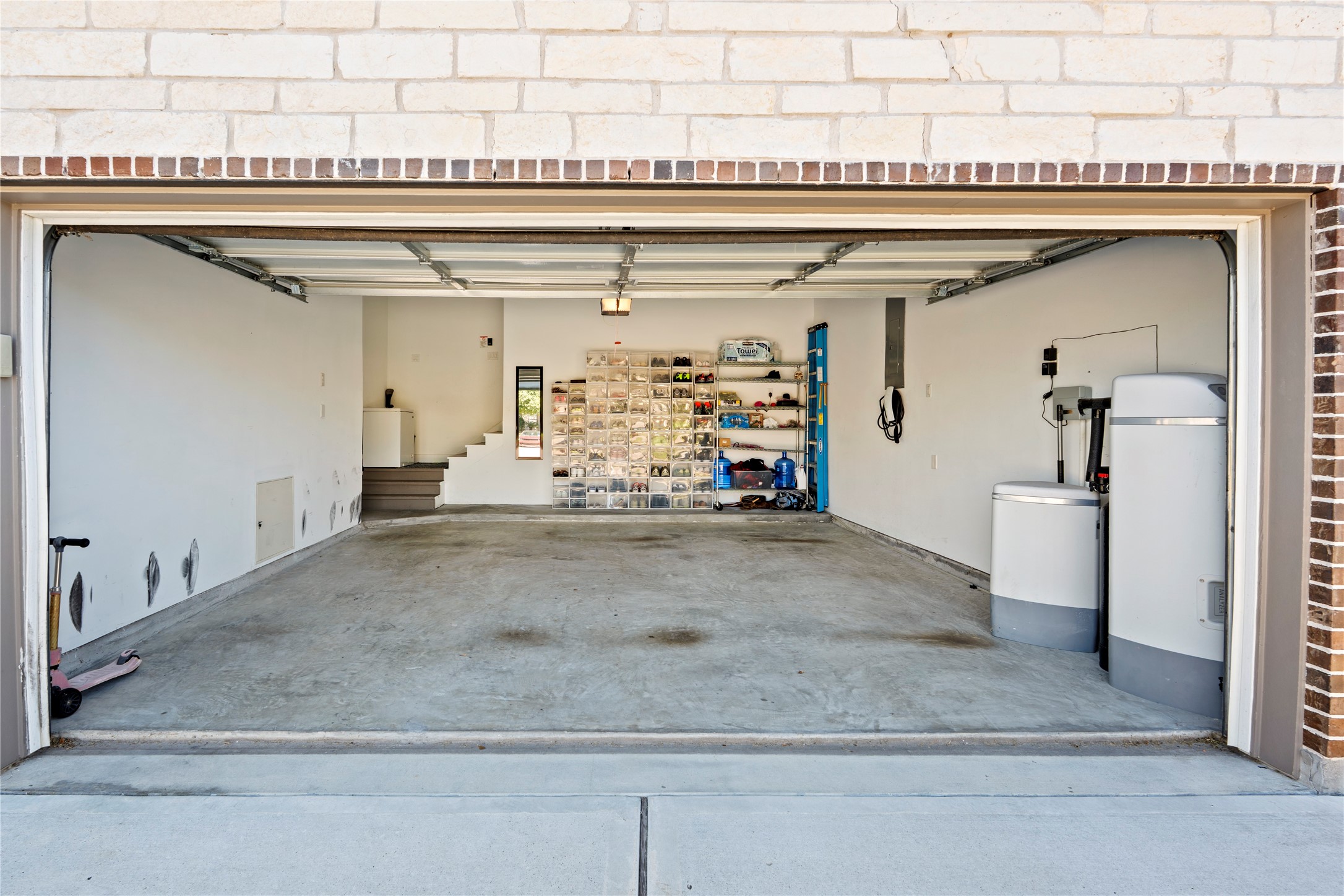 6207 Graff Net Court Spring, TX 77379 - Photo 49 of 49 Spacious 2-car garage with convenient stairs leading directly into the home.