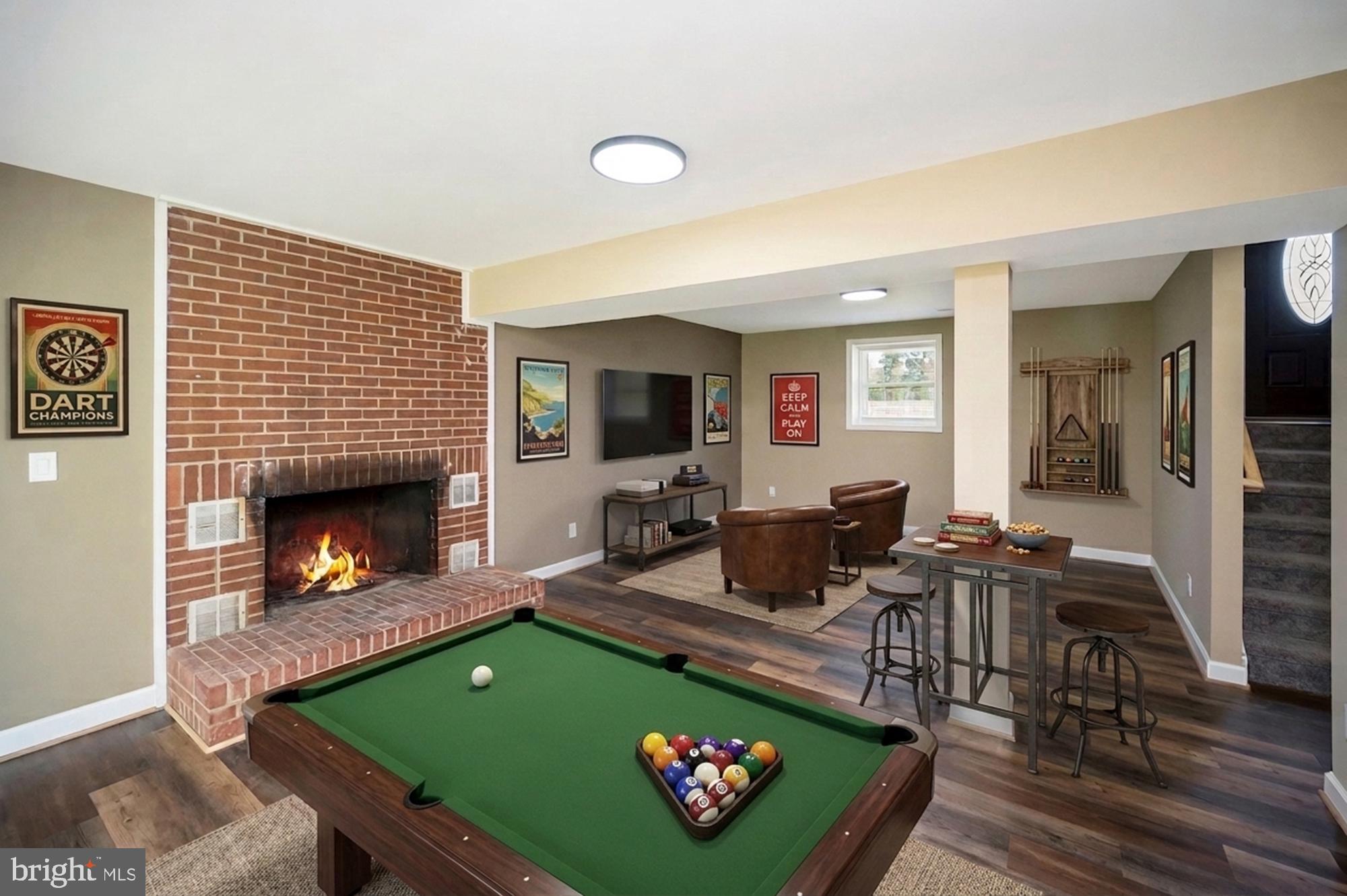 13452 Post Oak Road Spotsylvania, VA 22551 - Photo 44 of 56 a living room with furniture and a fireplace