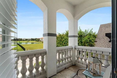 a view of two chairs in balcony