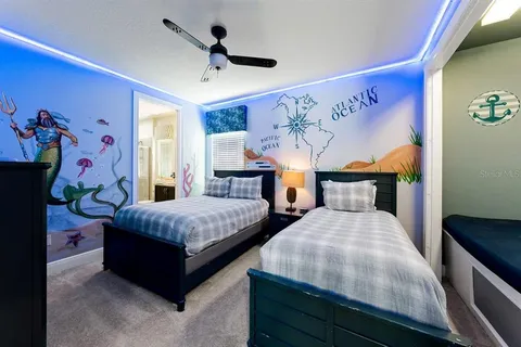 a bedroom with bed and a window