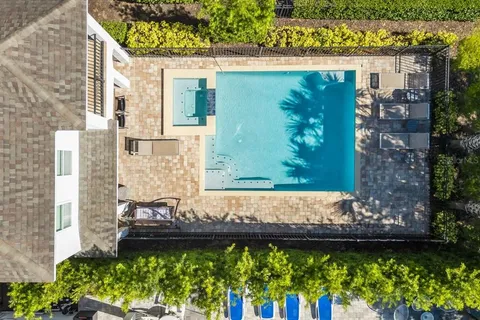 a view of a back yard of the house and a garden