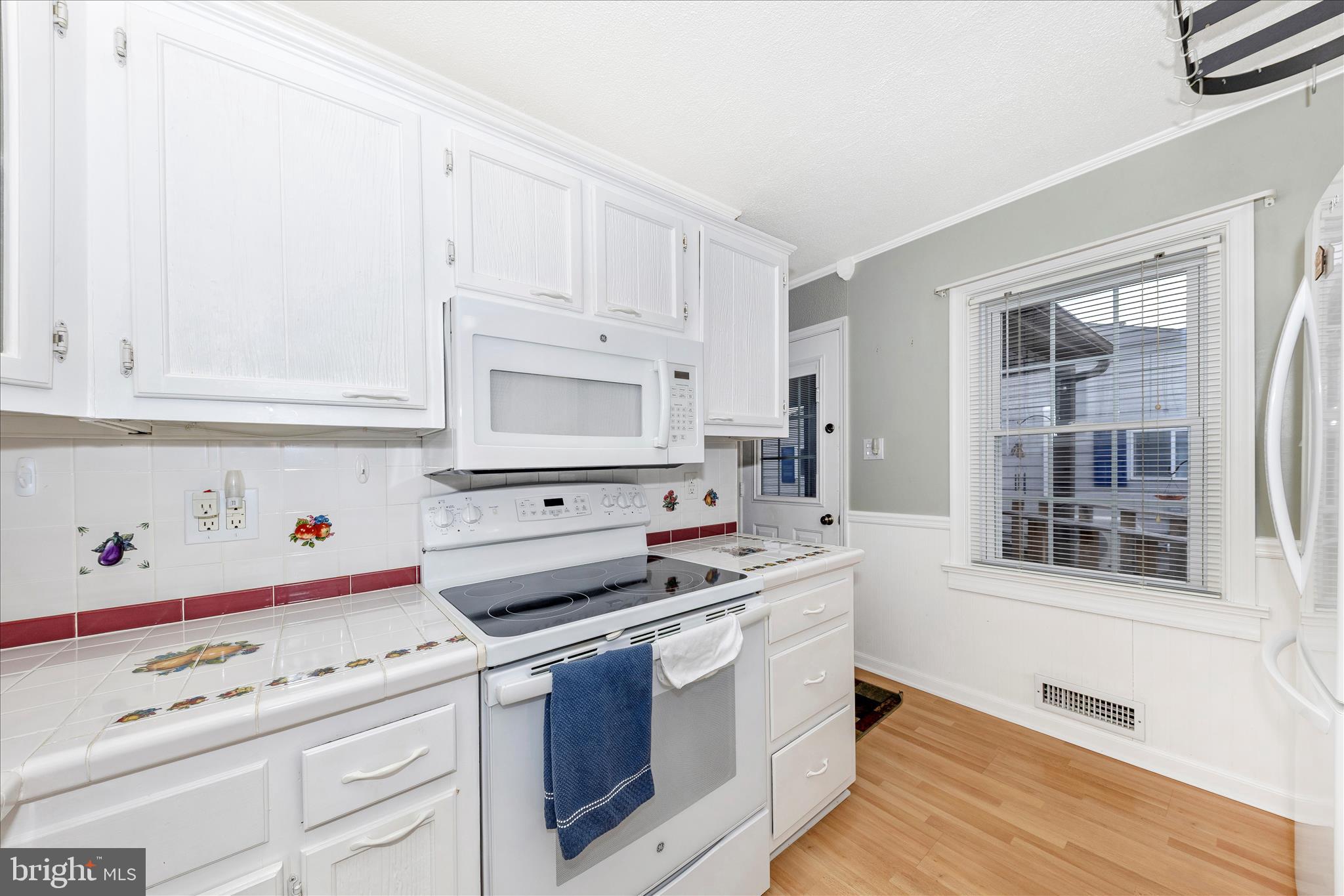 11304 Manse Road Hagerstown, MD 21740 - Photo 15 of 53 a kitchen with stainless steel appliances white cabinets and a sink