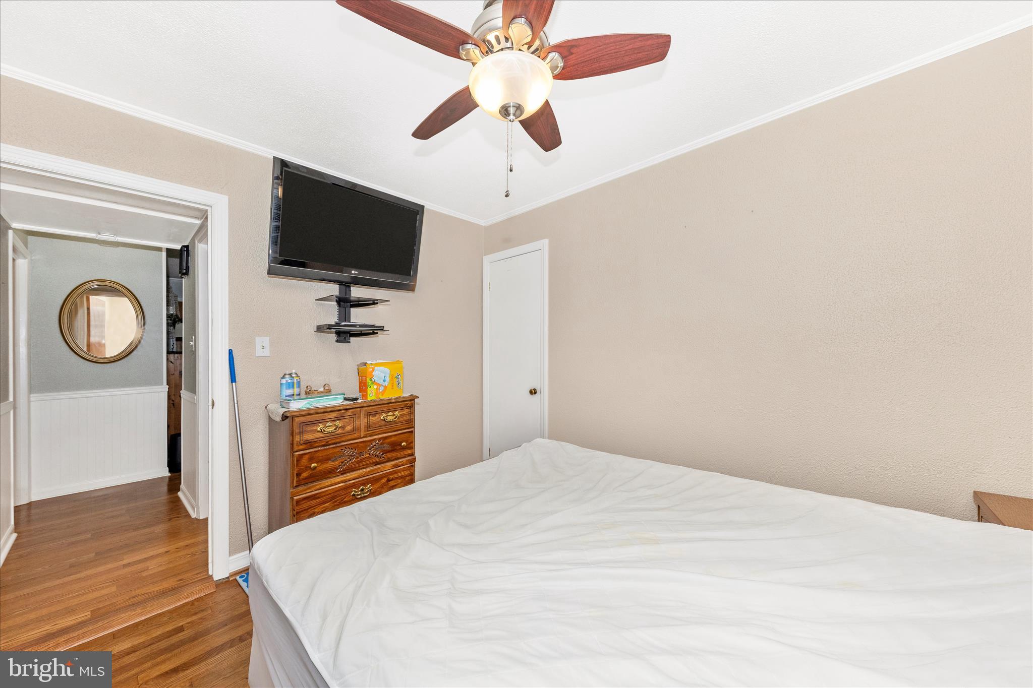 11304 Manse Road Hagerstown, MD 21740 - Photo 24 of 53 a bedroom with a bed and a flat tv screen on dresser