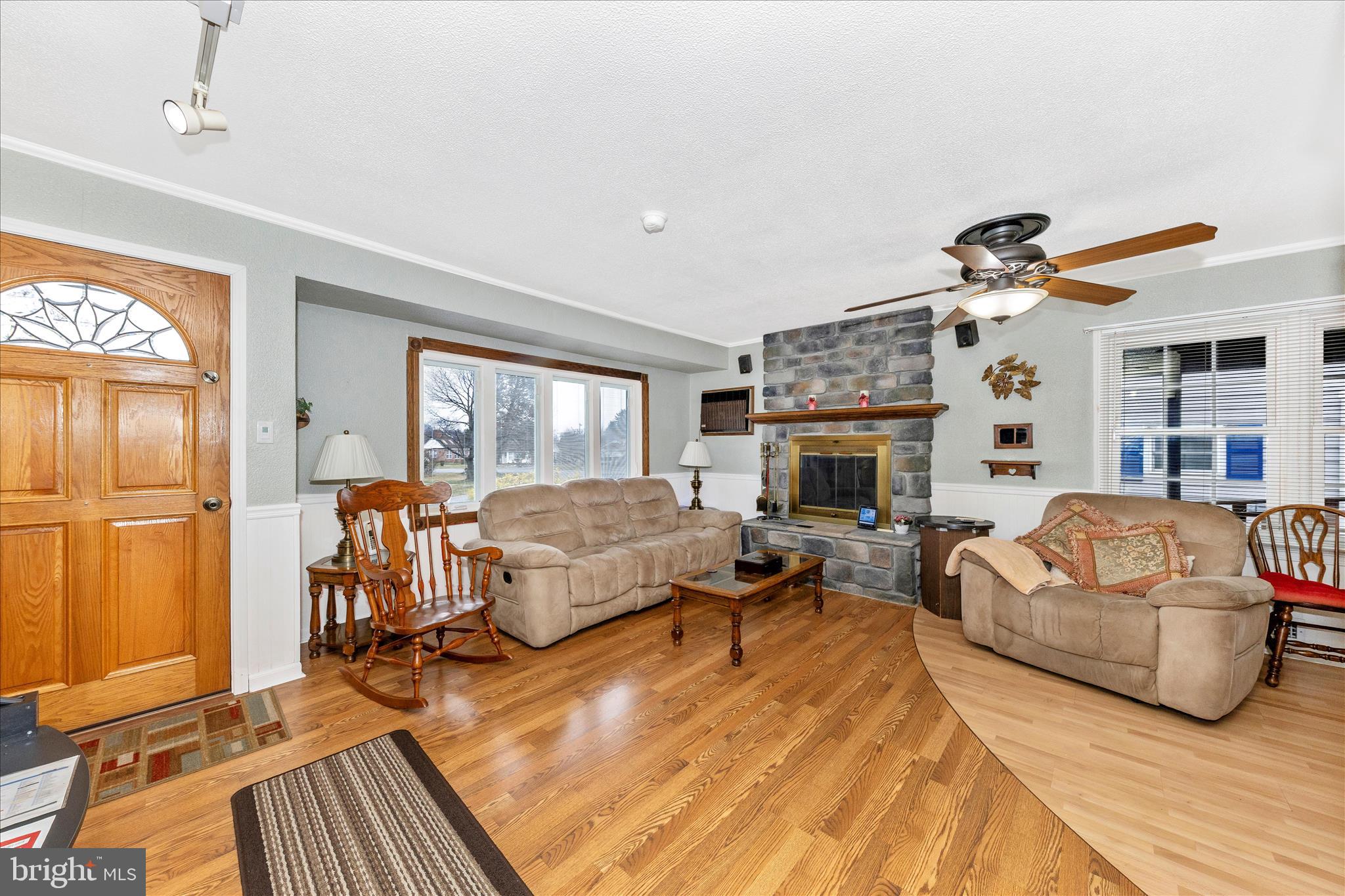 11304 Manse Road Hagerstown, MD 21740 - Photo 5 of 53 a living room with furniture fireplace and flat screen tv