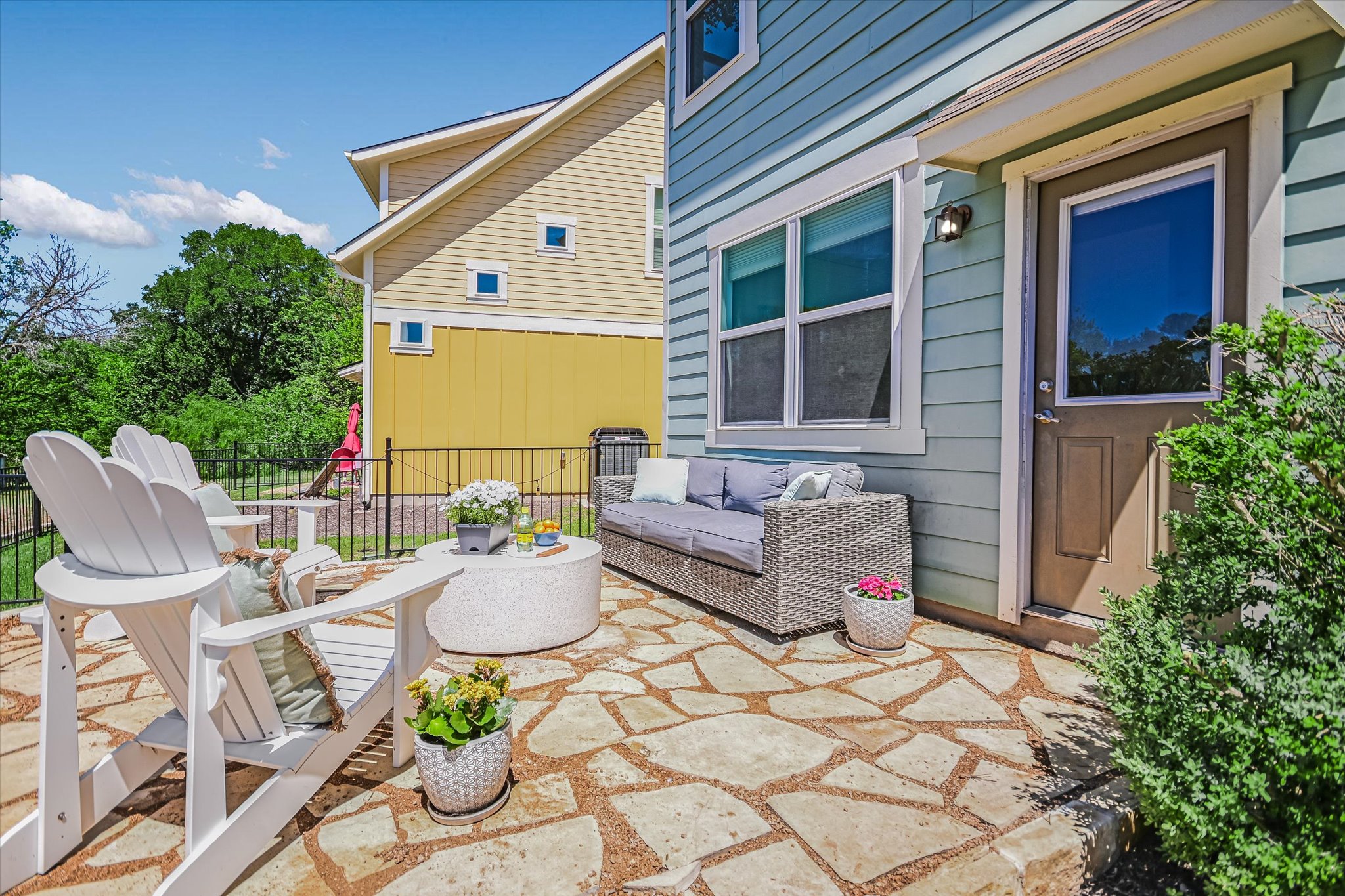 12224 Tawny Farms Road, Unit 145 Austin, TX 78748 - Photo 15 of 27 This beautiful stone patio offers plenty of room to relax and offers a serene view of the greenbelt.