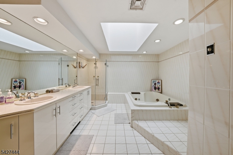 156 Kingsland Road Boonton, NJ 07005 - Photo 25 of 38 a bathroom with a tub sink and mirror