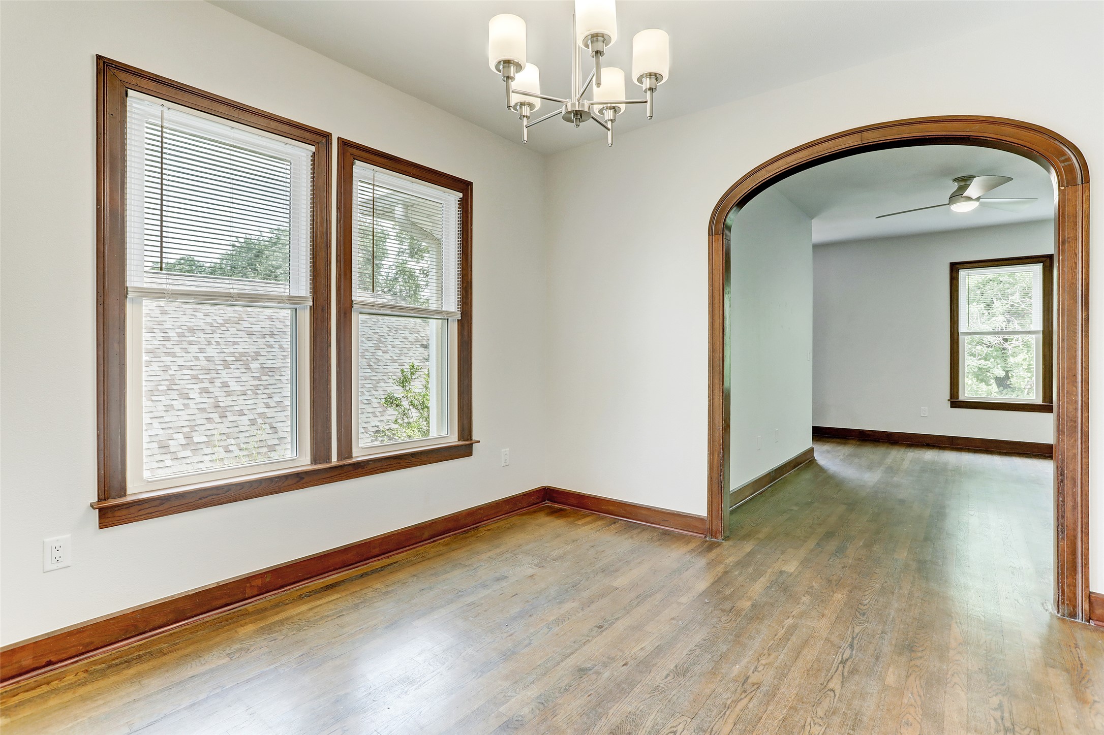 603 Bellevue Place, Unit B Austin, TX 78705 - Photo 5 of 22 a view of empty room with window and wooden floor