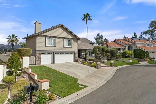 a view of a house with a sink and yard