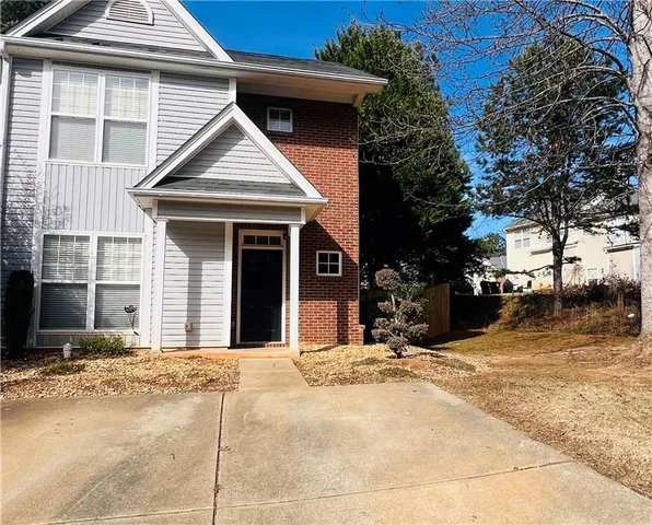 a view of a house with snow on the wall