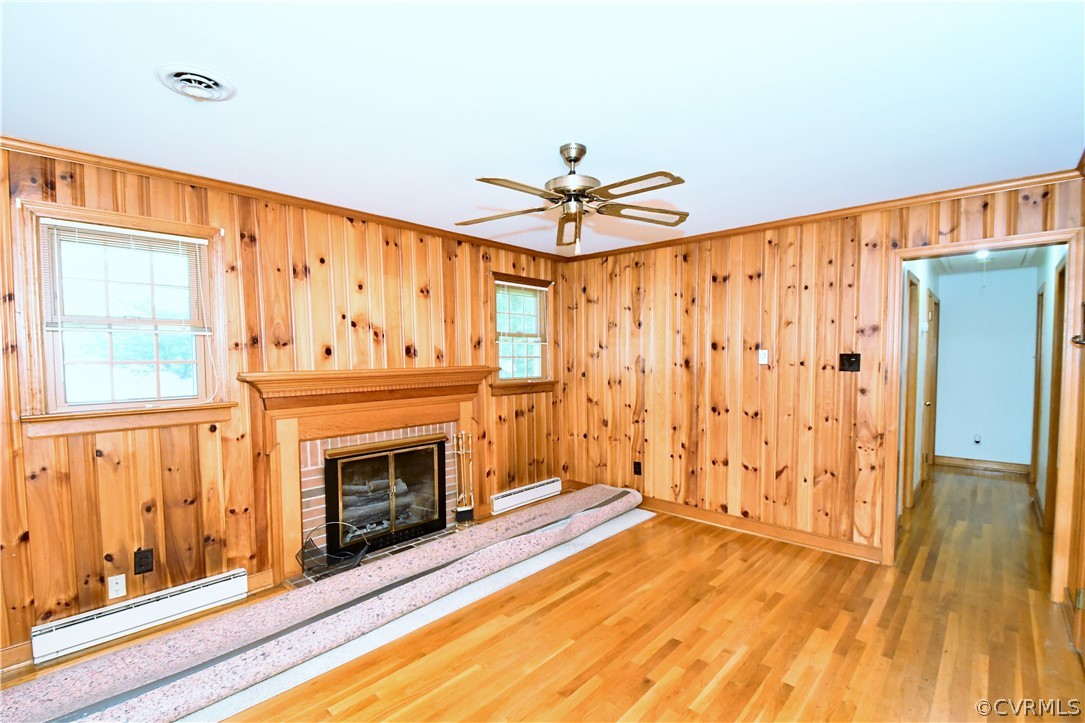 751 Courthouse Road North Chesterfield, VA 23236 - Photo 12 of 37 a view of an empty room with a fireplace and a window