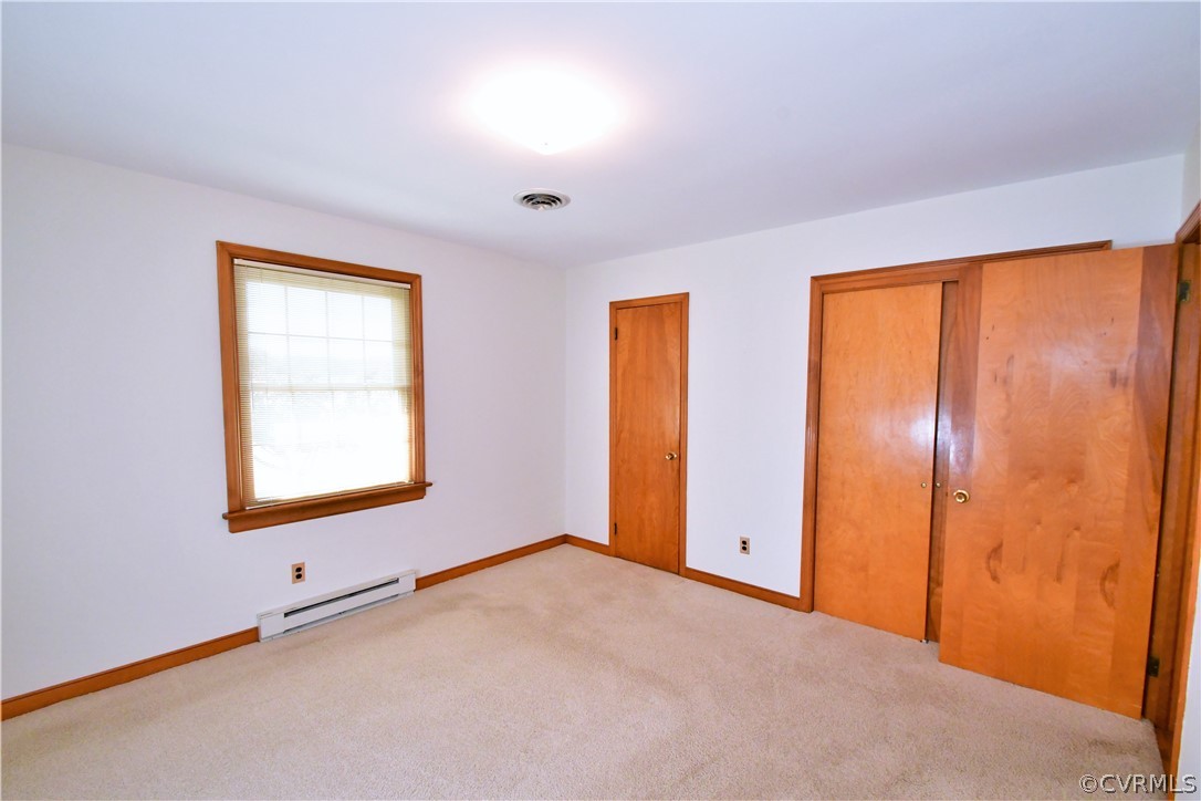 751 Courthouse Road North Chesterfield, VA 23236 - Photo 21 of 37 an empty room with windows