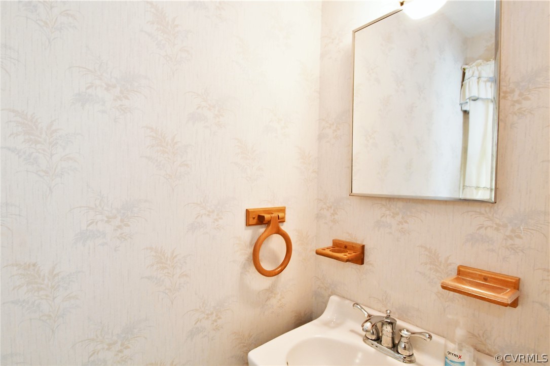 751 Courthouse Road North Chesterfield, VA 23236 - Photo 22 of 37 a bathroom with a toilet and a mirror