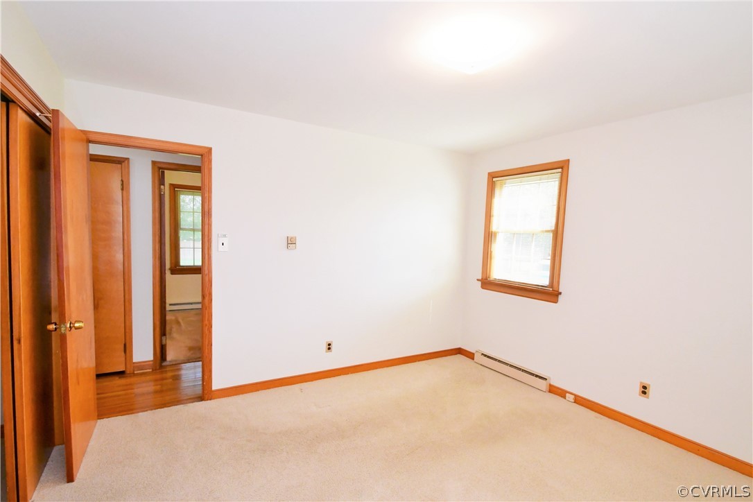 751 Courthouse Road North Chesterfield, VA 23236 - Photo 23 of 37 a view of an empty room with a window