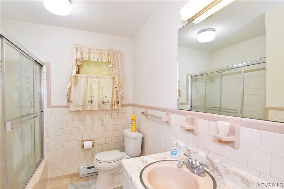 751 Courthouse Road North Chesterfield, VA 23236 - Photo 25 of 37 a bathroom with a granite countertop toilet sink and mirror