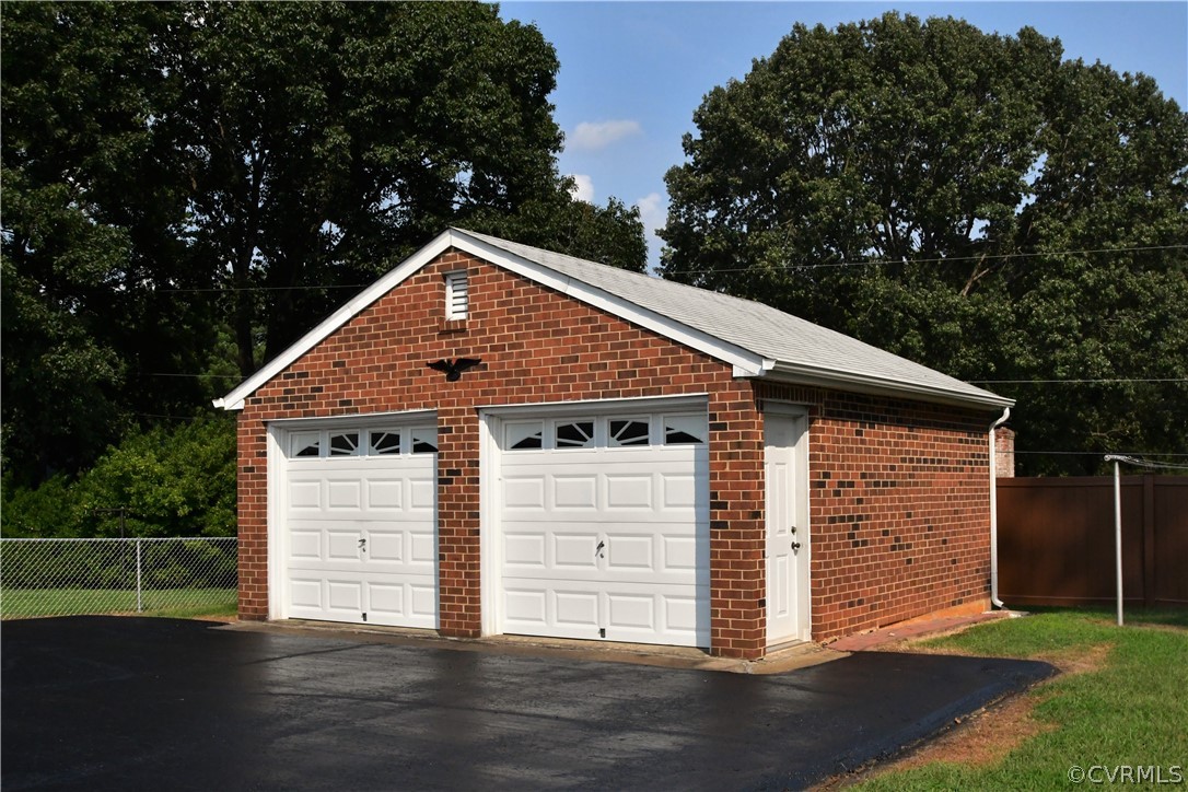 751 Courthouse Road North Chesterfield, VA 23236 - Photo 3 of 37 a front view of house with yard and trees in the background