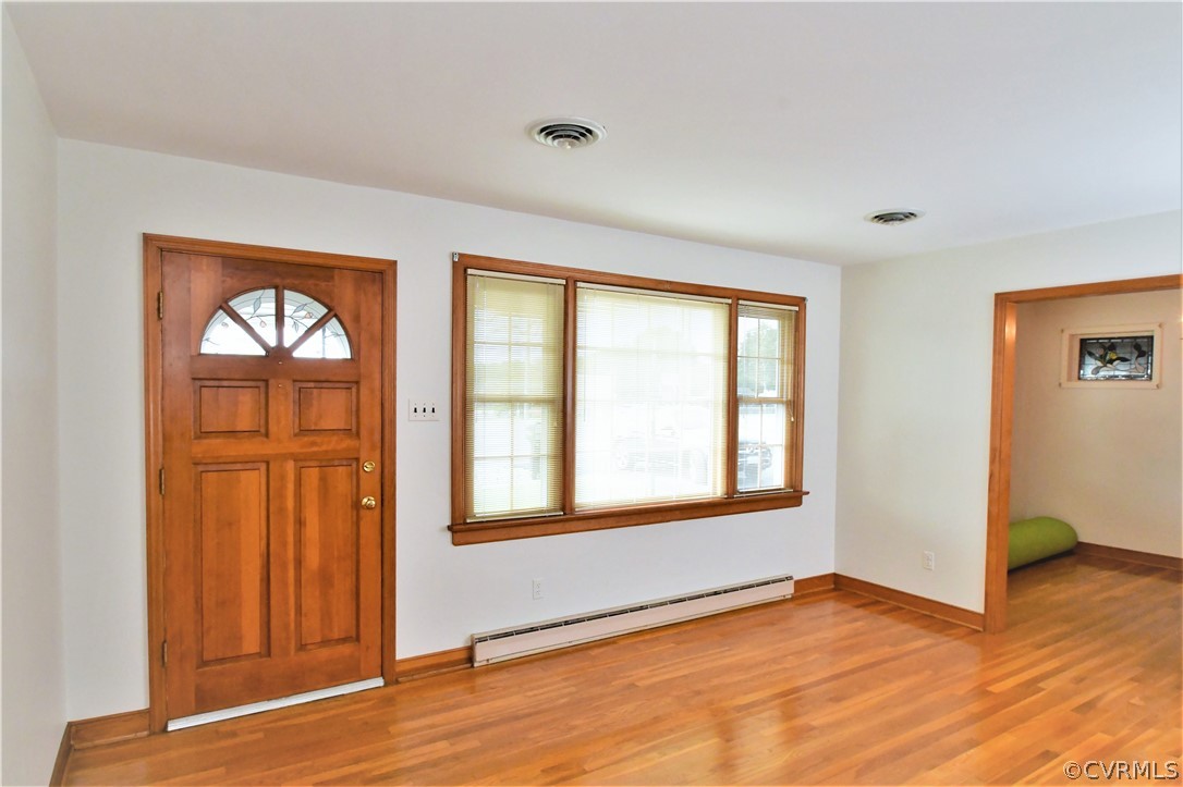 751 Courthouse Road North Chesterfield, VA 23236 - Photo 7 of 37 an empty room with wooden floor and windows