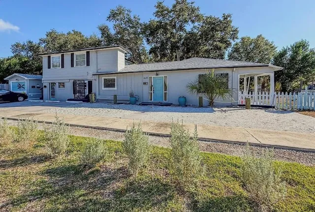 a kitchen with granite countertop stainless steel appliances a counter space and cabinets