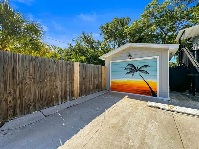 a kitchen with stainless steel appliances a refrigerator sink and stove