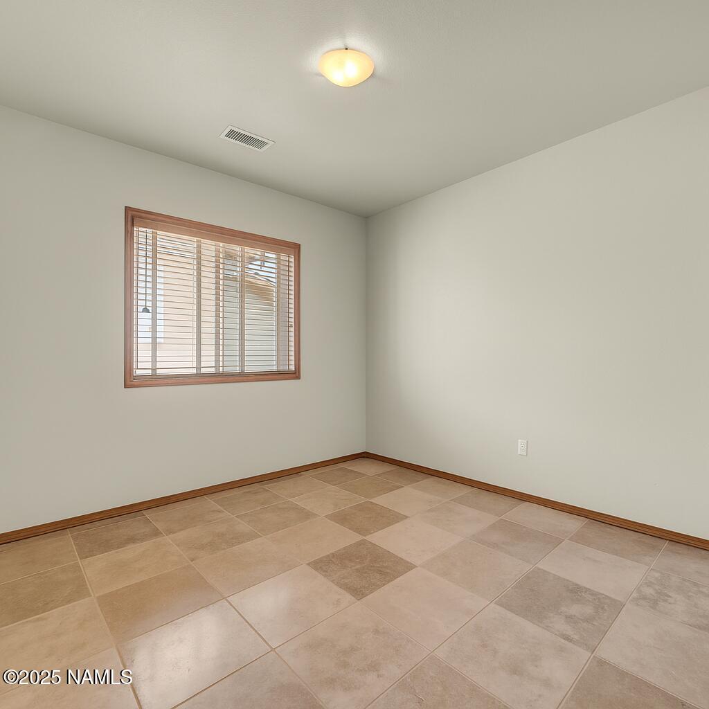 9644 North Bryant Road Flagstaff, AZ 86004 - Photo 18 of 54 Sitting area in primary bedroom