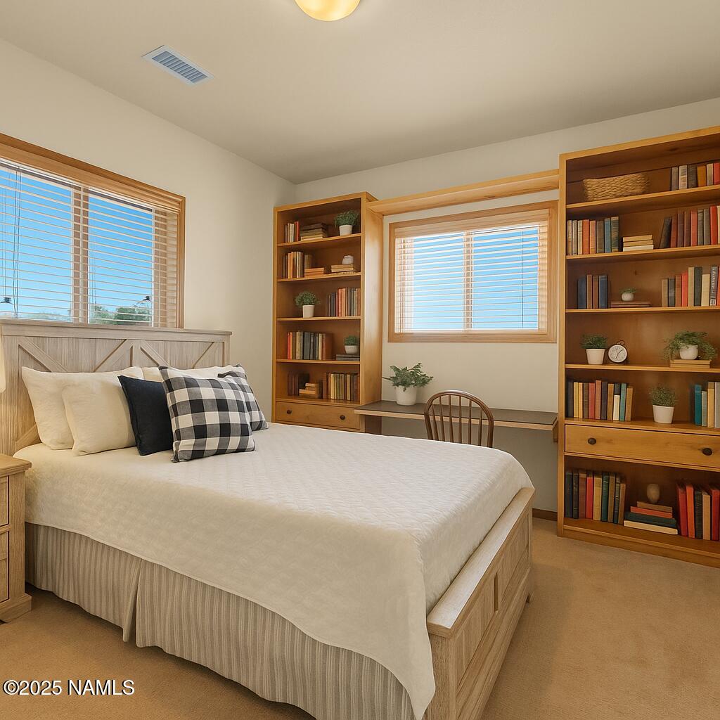 9644 North Bryant Road Flagstaff, AZ 86004 - Photo 22 of 54 2nd Bedroom with built-in shelving