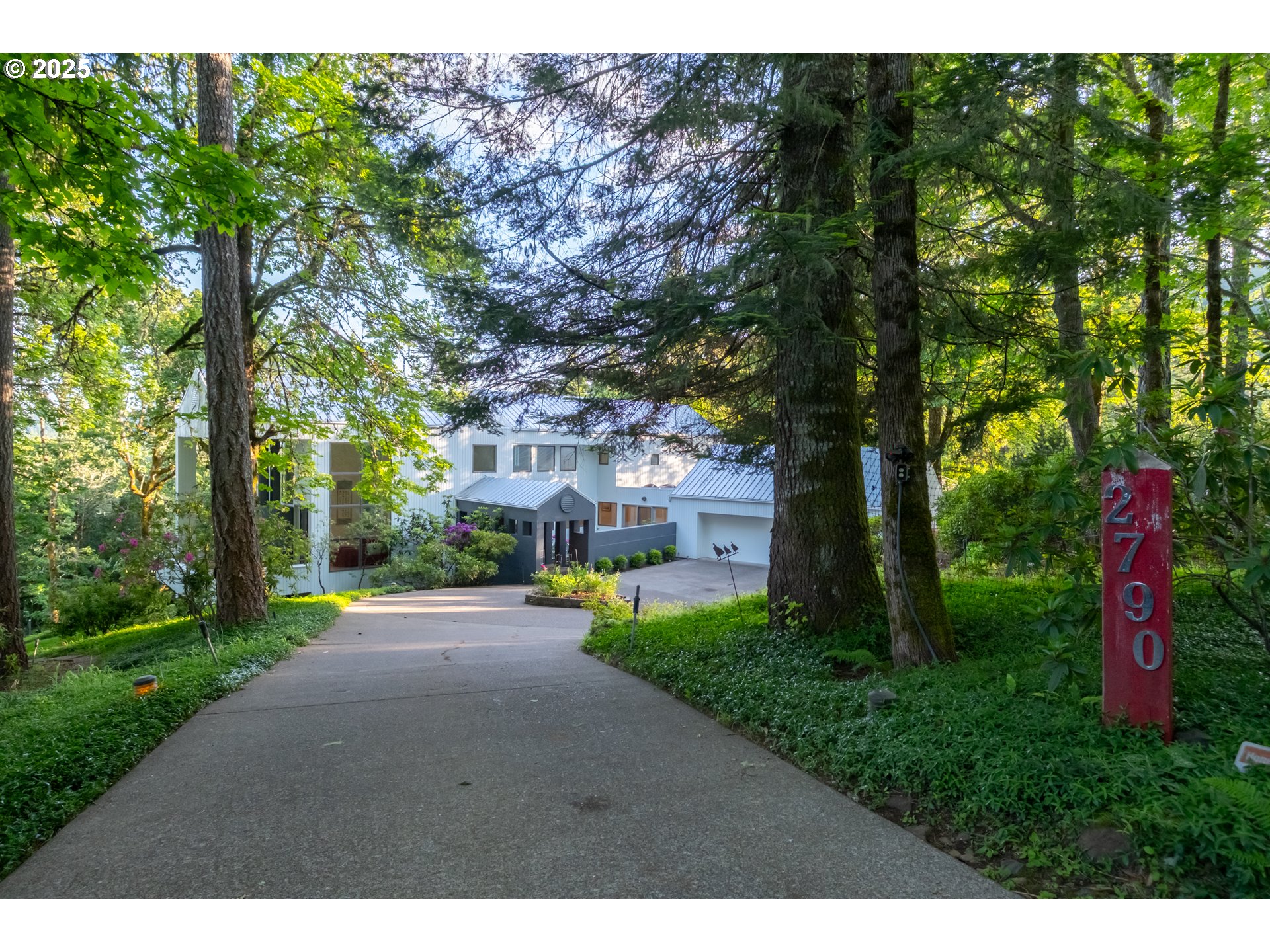 2790 Northwest Sulphur Springs Road Corvallis, OR 97330 - Photo 2 of 48 a view of a street with a building and a tree